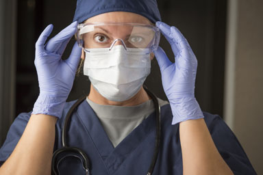 Nurse with personal protective equipment